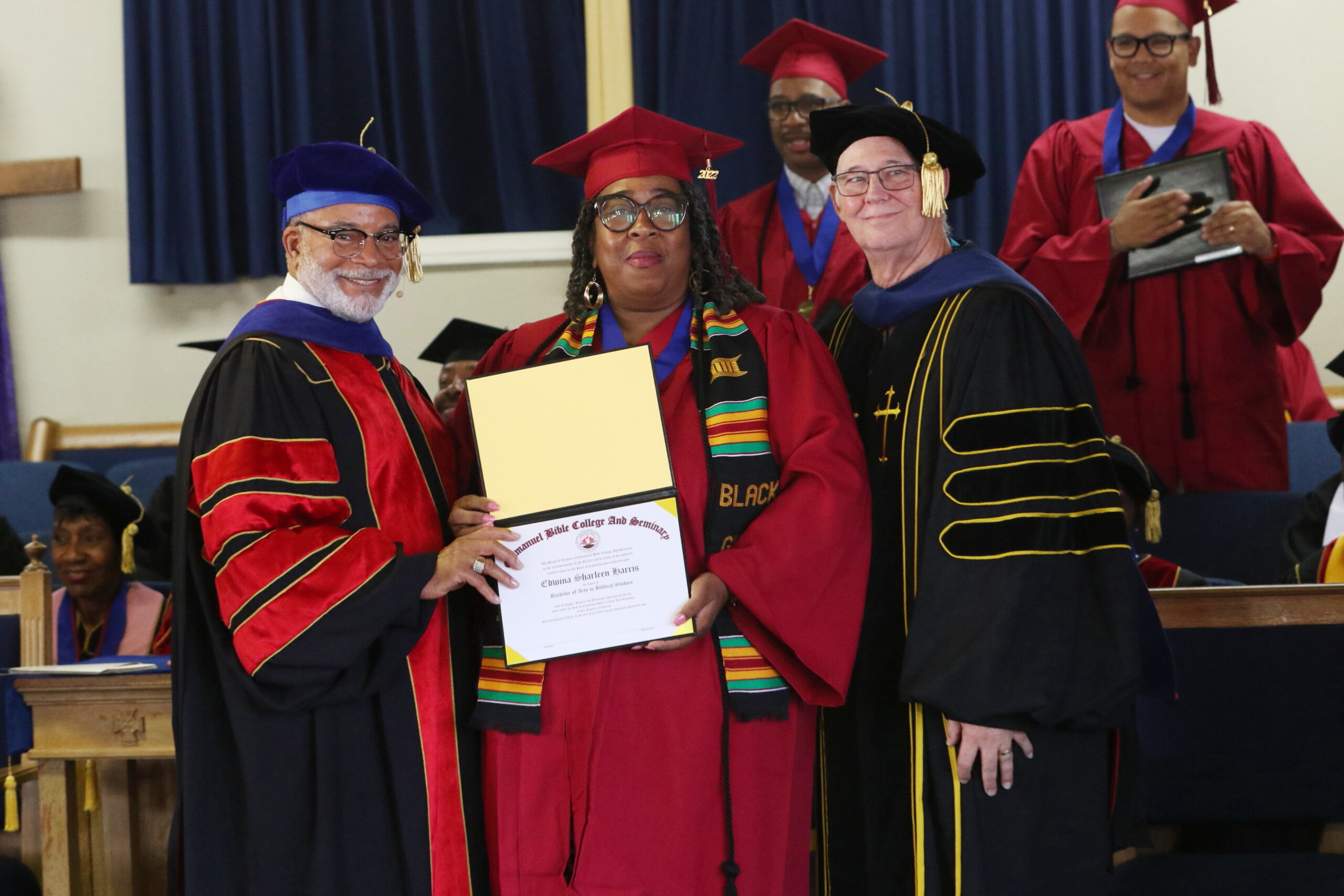 dr underwood and teacher with a graduate