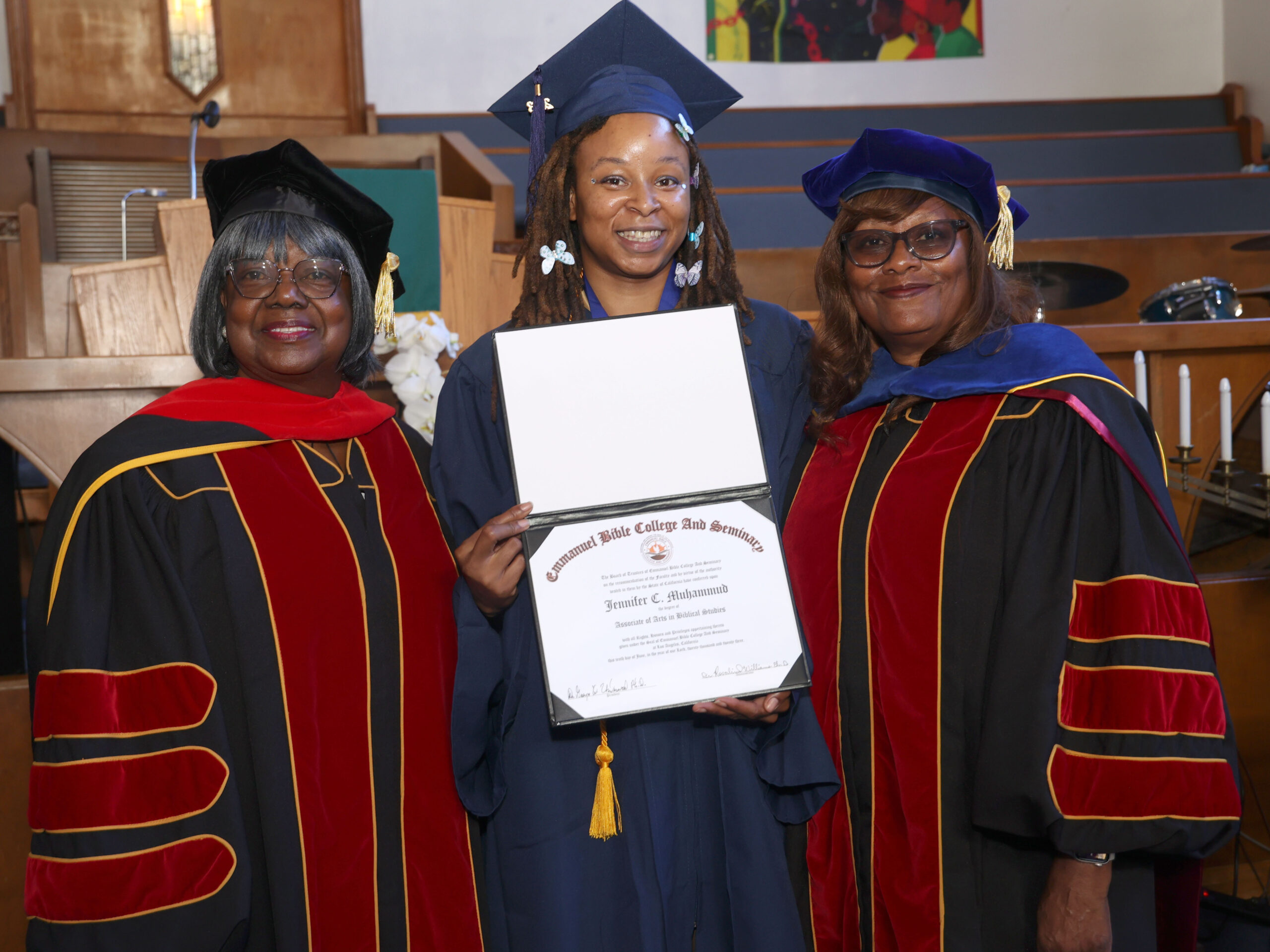 dr rosalind and Dr. Betty Howard with a graduate